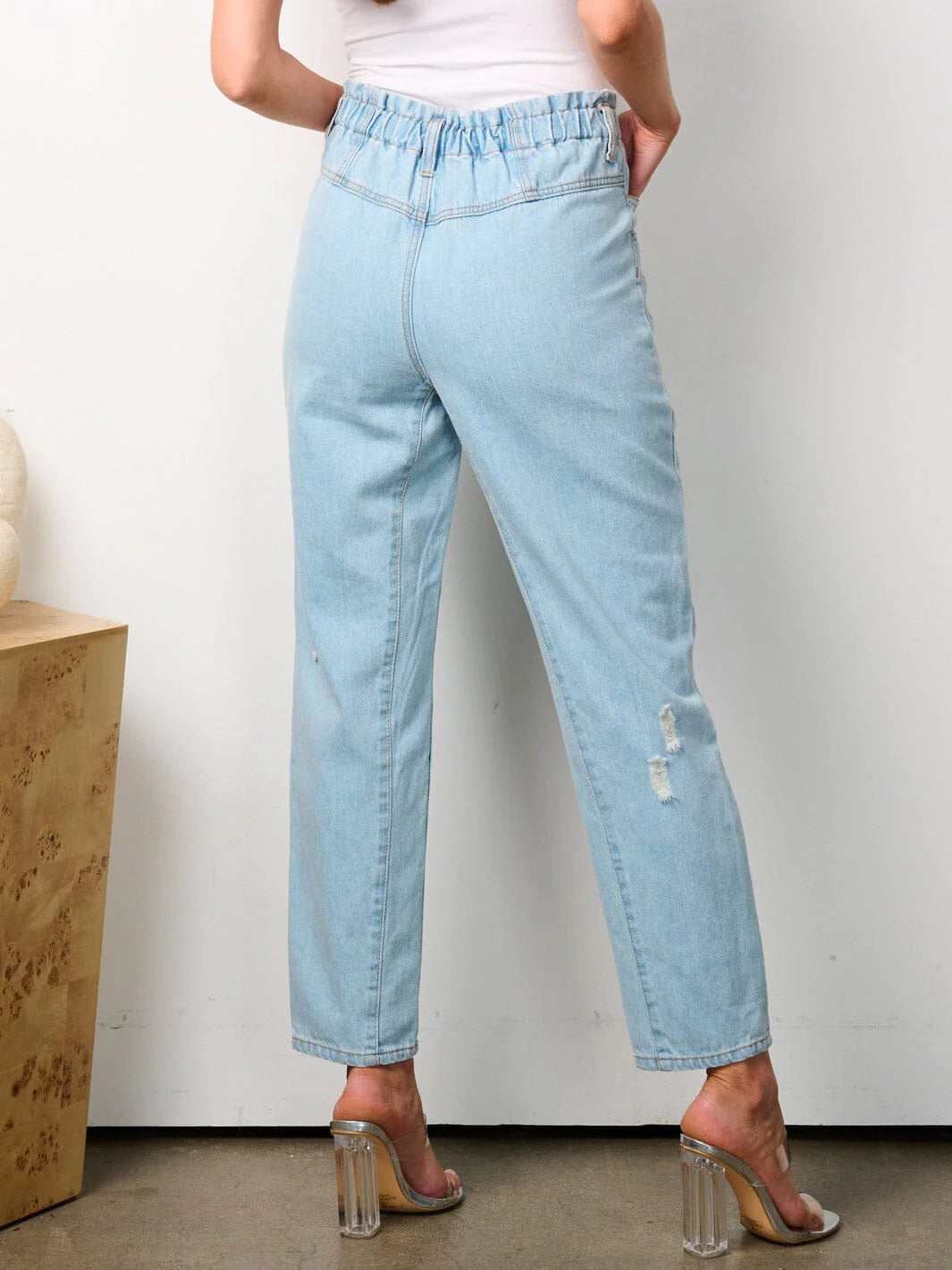 100% cotton women's denim pants. Elastic waist button closure pockets distressed denim jeans