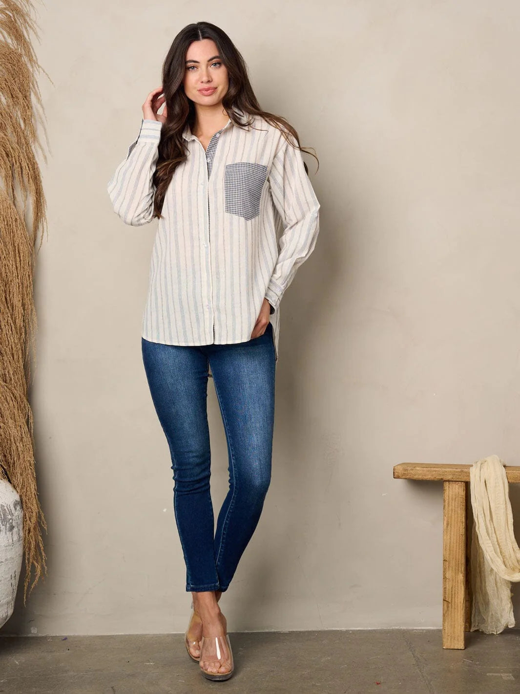 100% cotton women's shirt. Long sleeve front pocket button up stripes top.