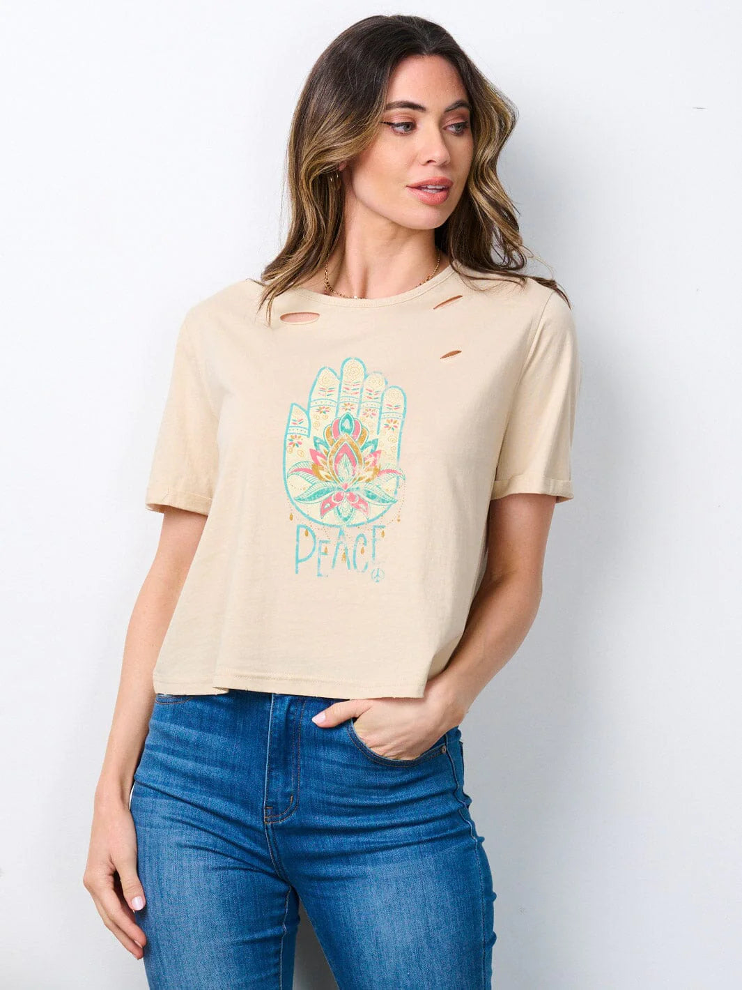 100% cotton women's short sleeve t-shirt. Graphic distressed top