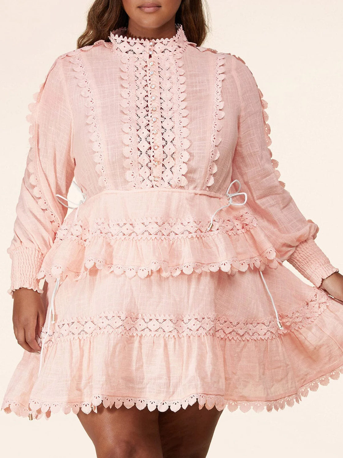 100% cotton plus size long sleeve mock neck tiered ruffle mini dress.