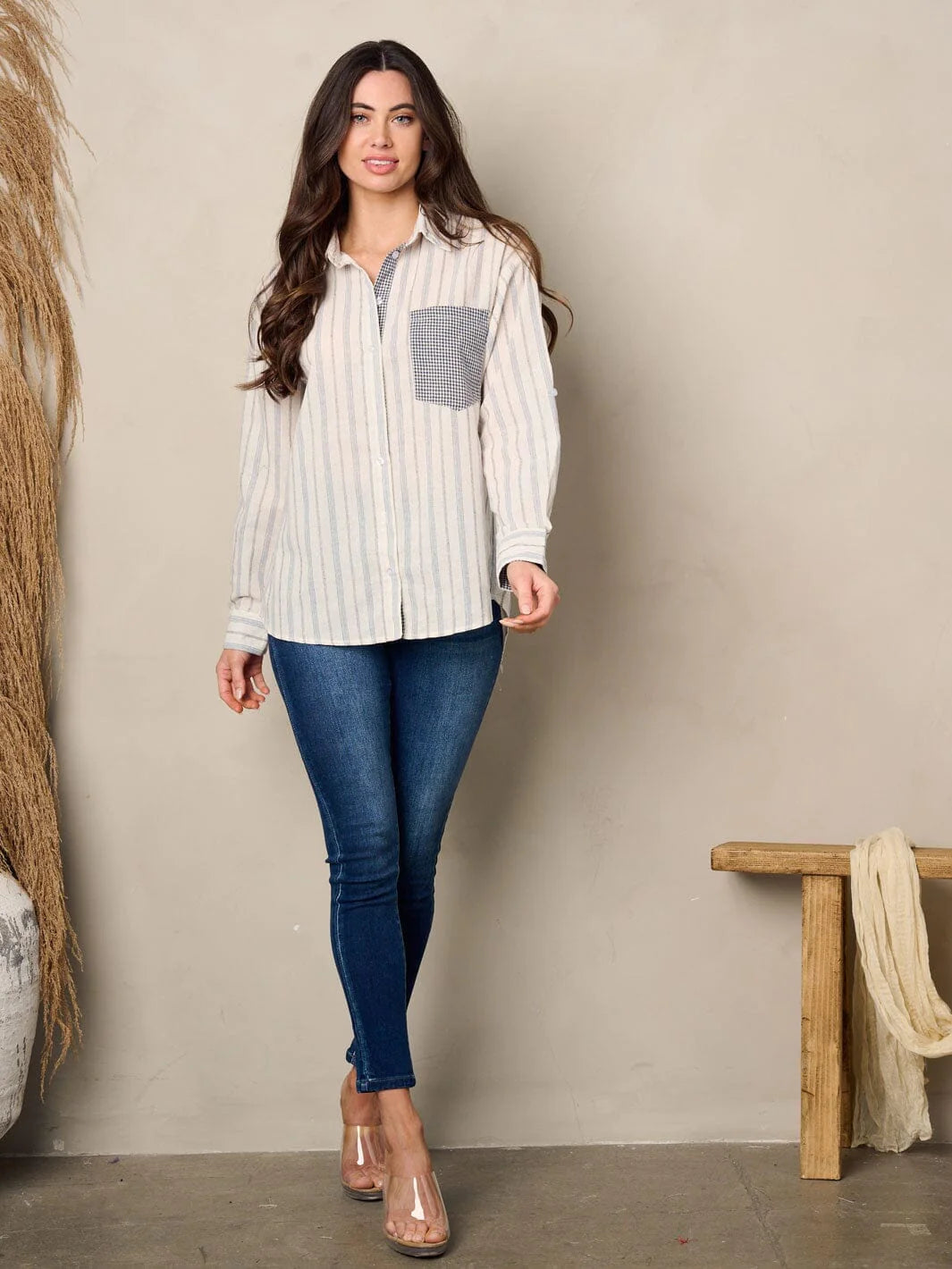 100% cotton women's shirt. Long sleeve front pocket button up stripes top.