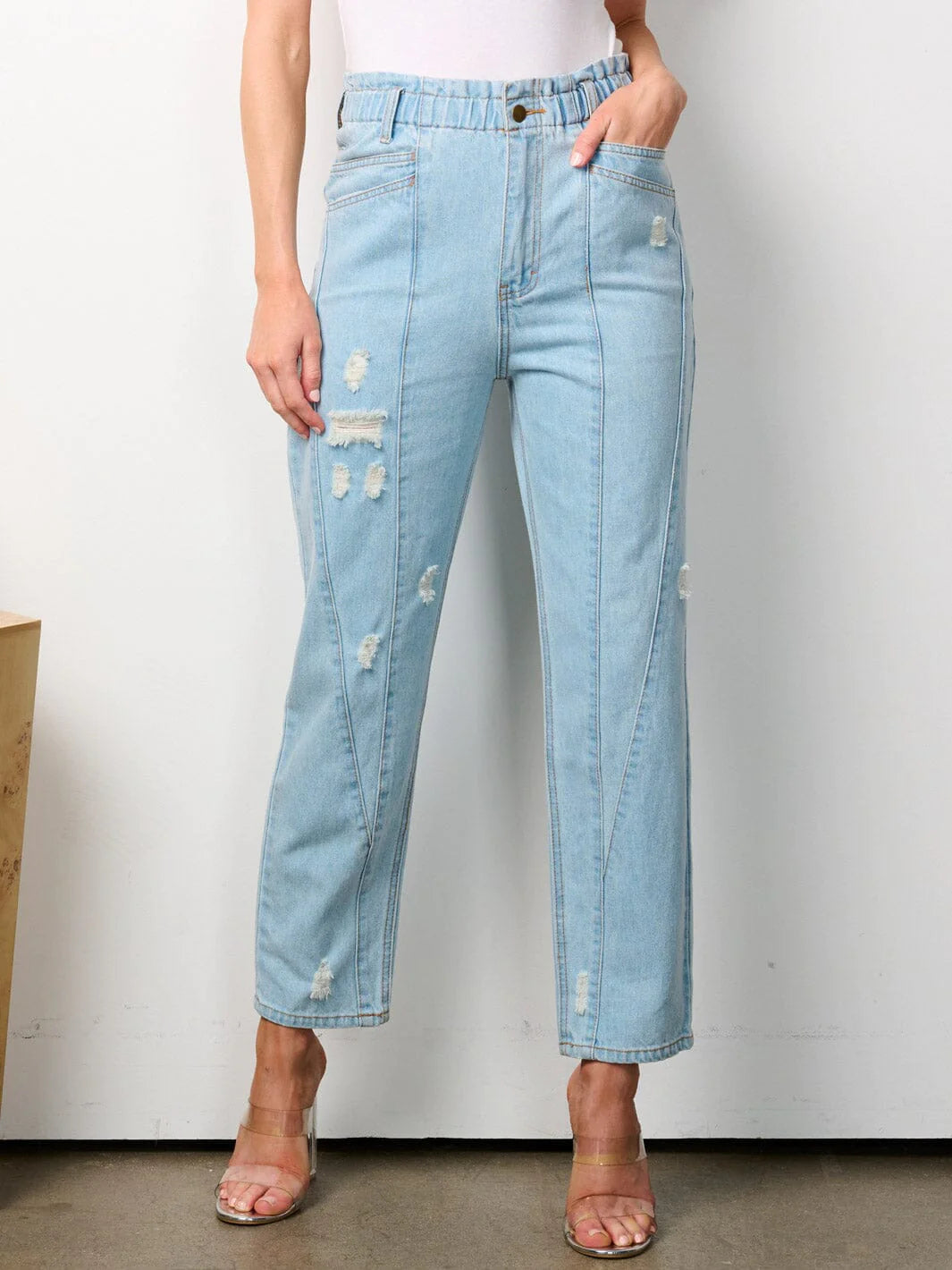 100% cotton women's denim pants. Elastic waist button closure pockets distressed denim jeans