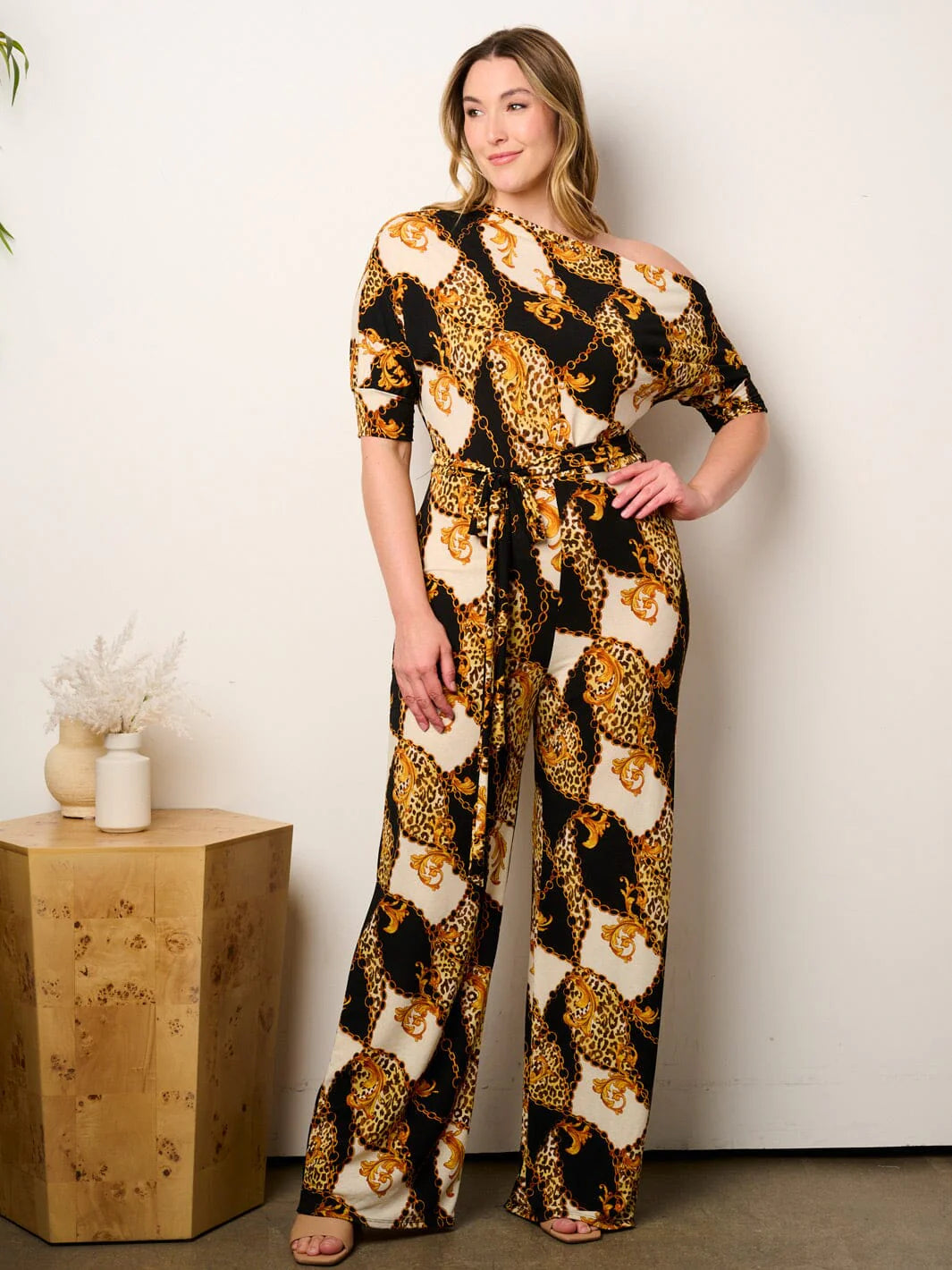 Plus size off shoulder short sleeve self tie animal print wide leg jumpsuit