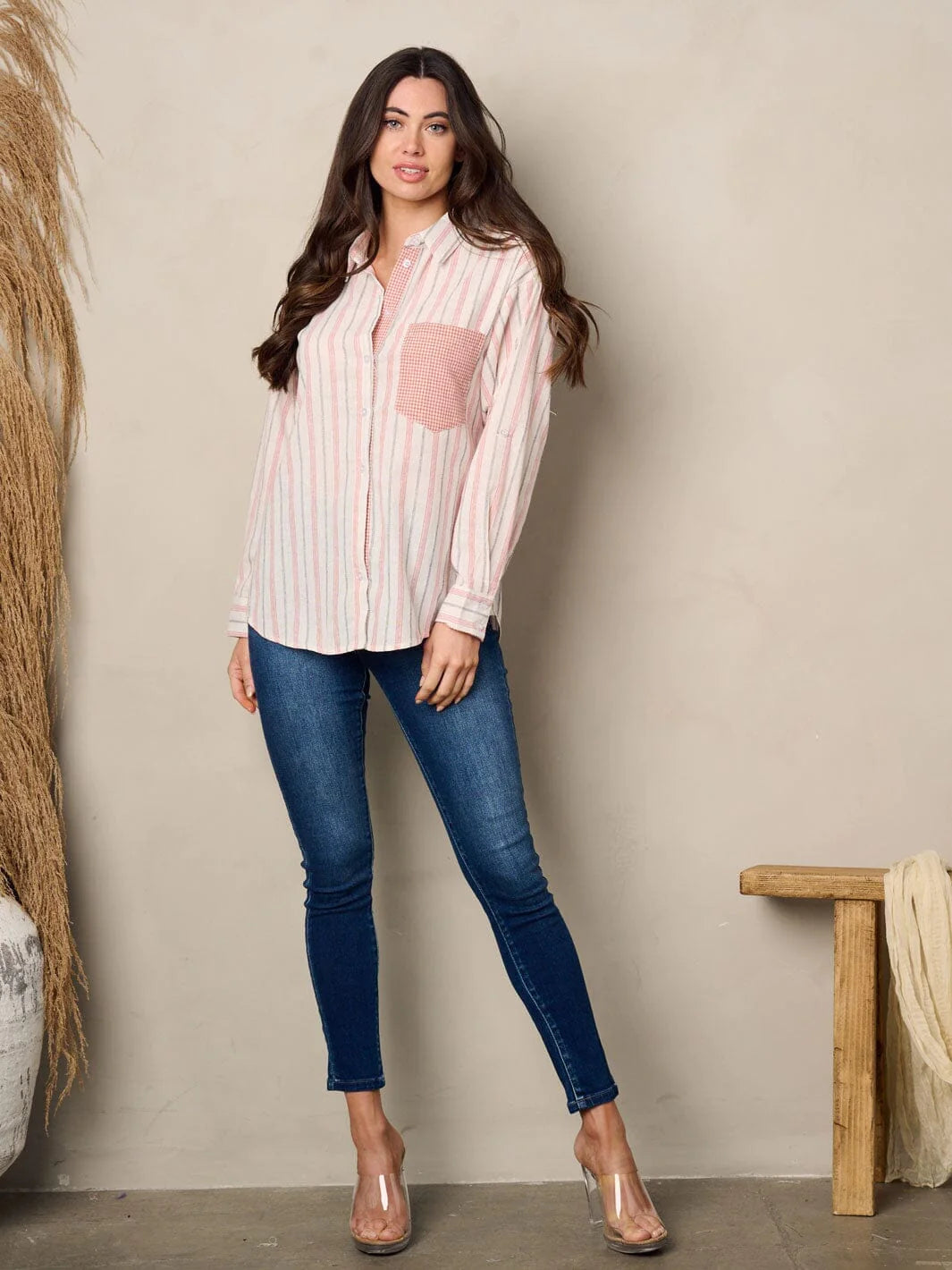 100% cotton women's shirt. Long sleeve front pocket button up stripes top.