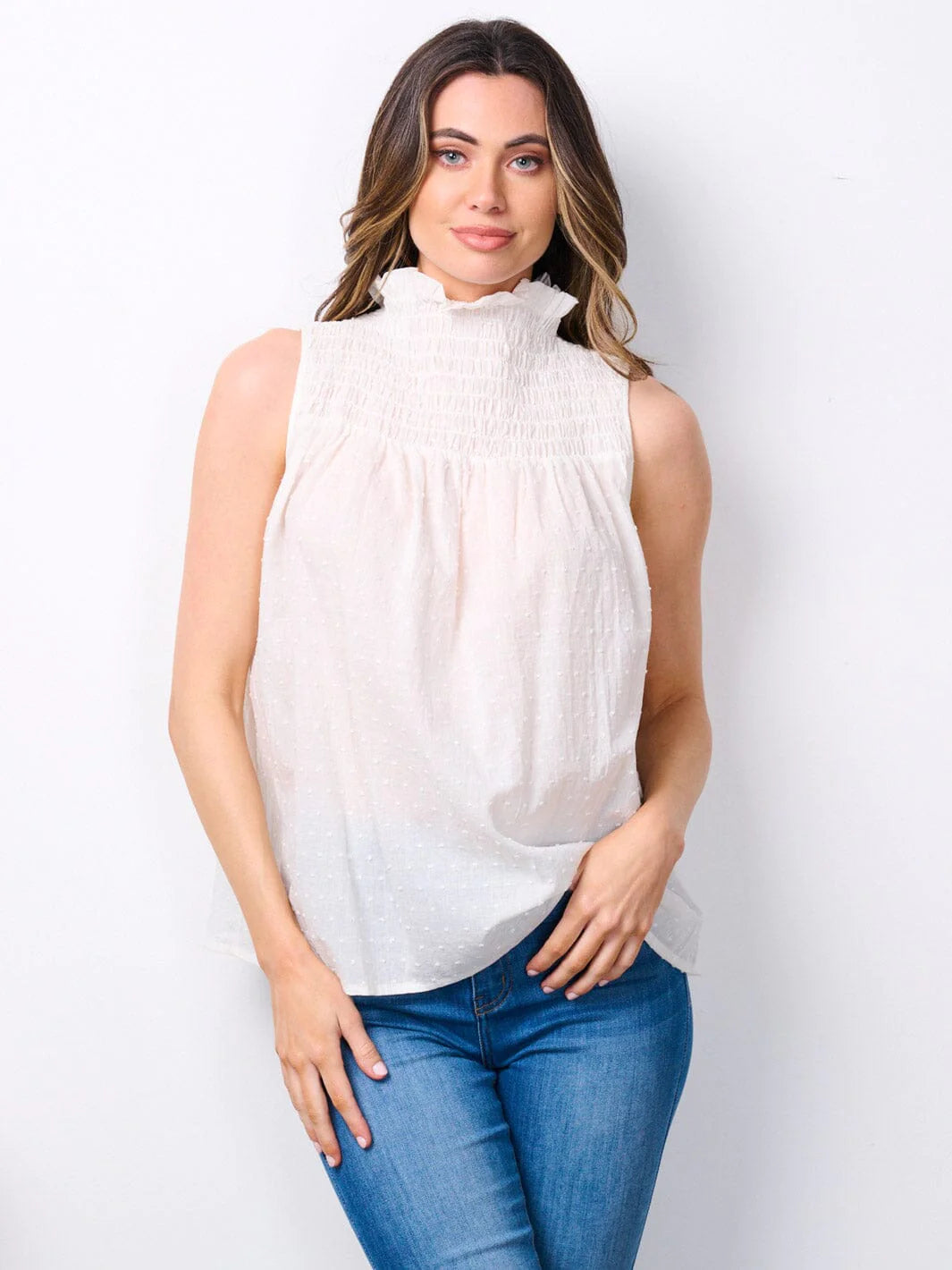 100% Cotton Tank Top. Sleeveless mock neck swiss detailed tank top